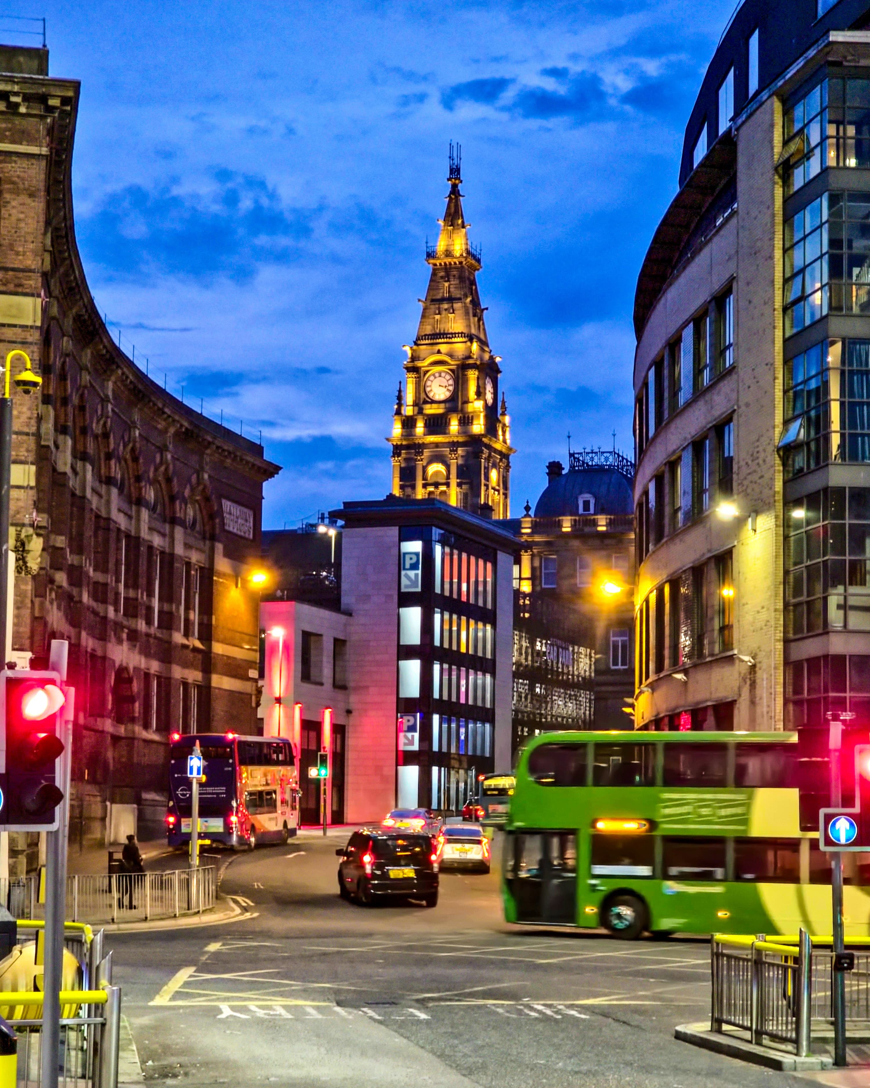Evening city traffic with clocktower in Liverpool